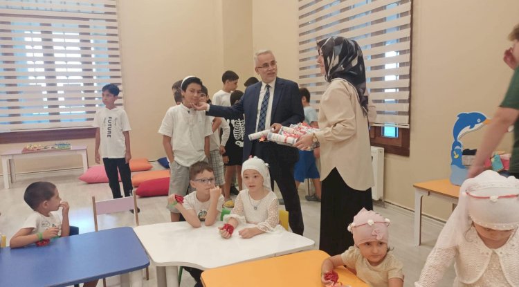 Bilgiç kuran kursu kapanış törenine katıldı